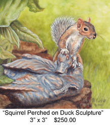Squirrel Perched on Duck Sculpture c